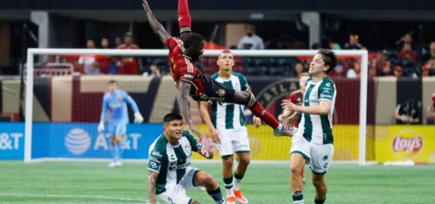 Atlanta United forward Jamal Thiaré, top center left, is fouled by Santos Laguna defender Bruno Agustin Amione (2), bottom center left, during the second half of a Leagues Cup match soccer match on Aug. 4 in Atlanta. (Miguel Martinez/Atlanta Journal-Constitution)