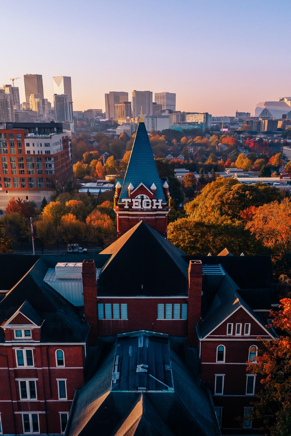 Tech tower and campus at dusk with the city in the background